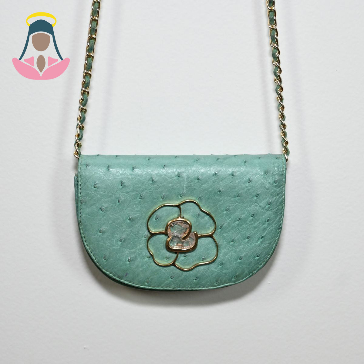 Bolsa pequena azul com flor