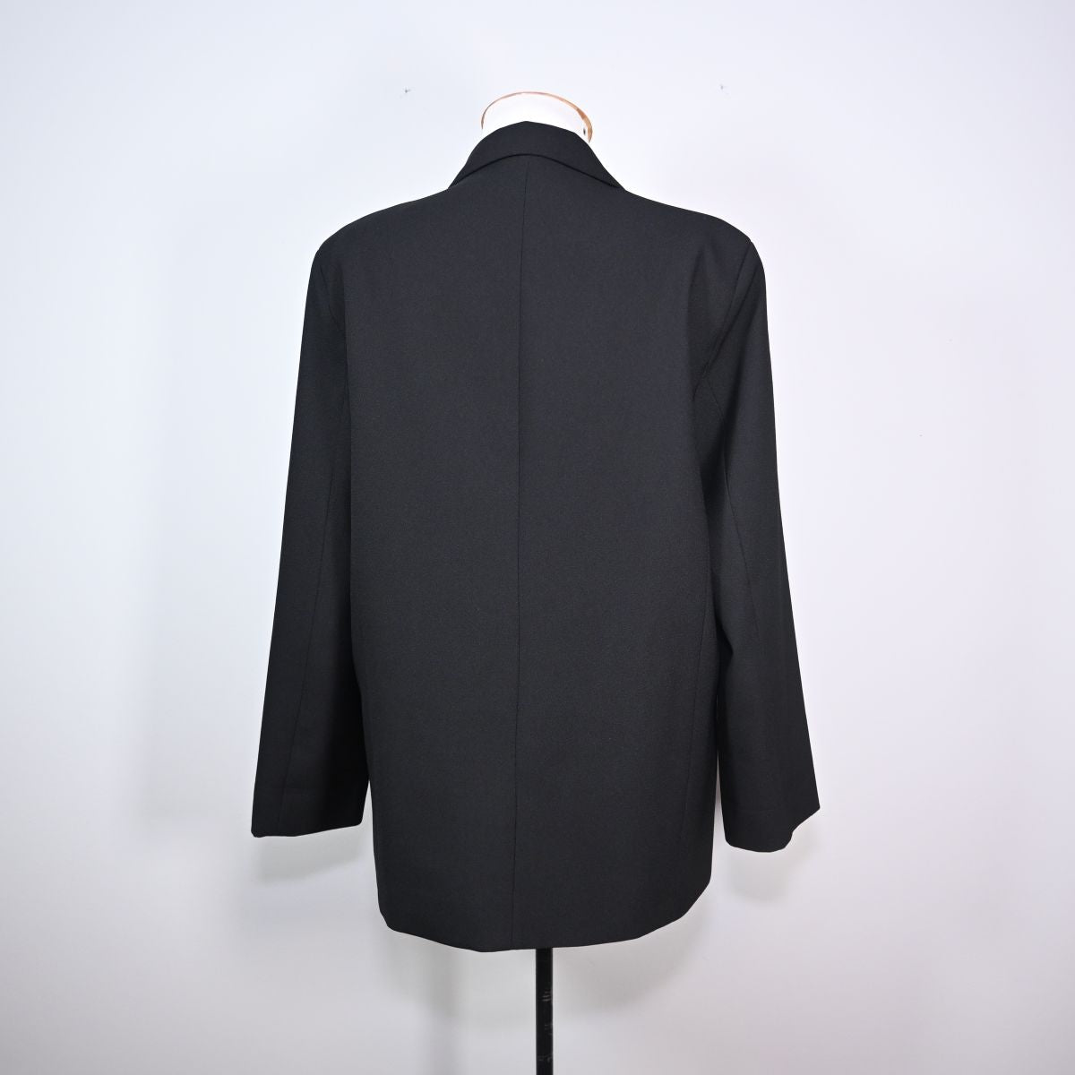 Blazer preto com um botão
