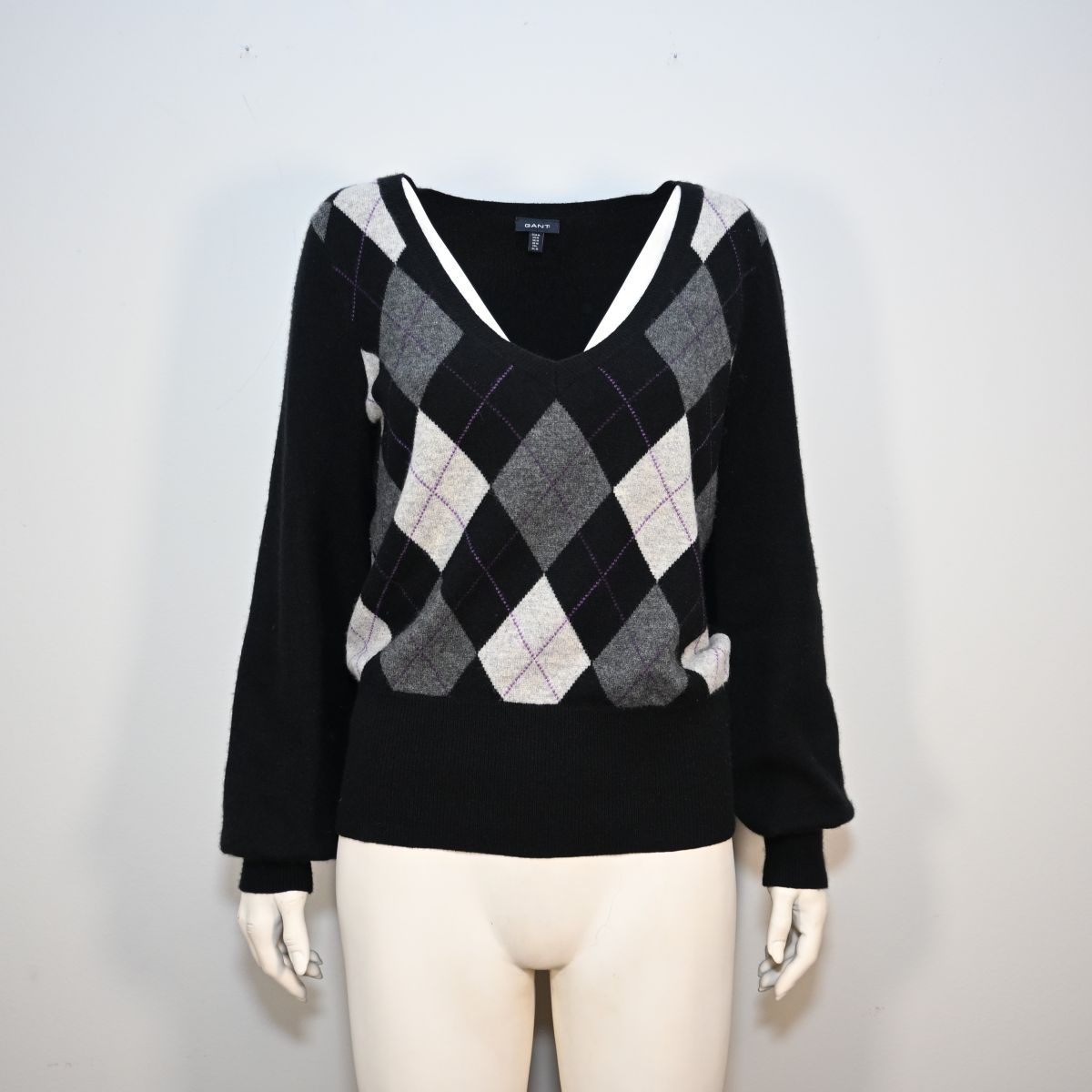 Malha preta com argyle