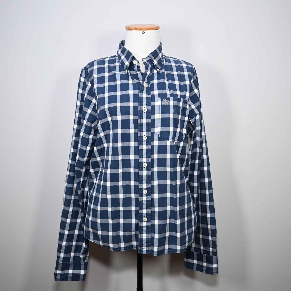 Camisa xadrez azul e branca
