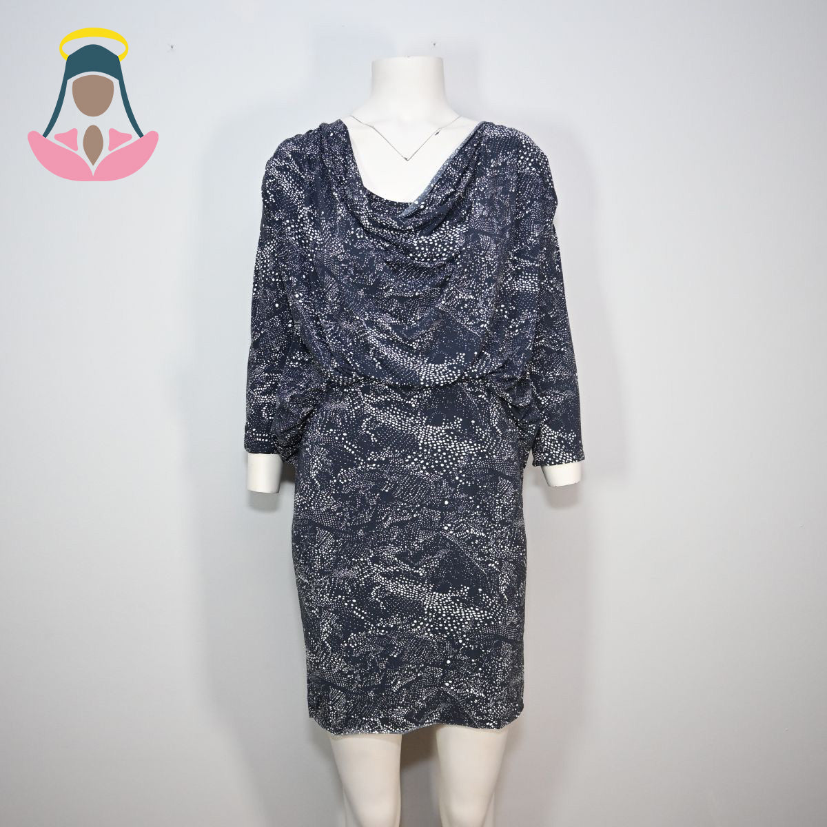 Vestido preto com poá branco